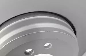 Перфорированный тормозной диск Otto Zimmermann 150.3405.20 фотография 1.