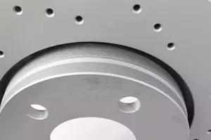 Перфорированный тормозной диск Otto Zimmermann 600.3232.52 фотография 4.