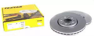 Перфорированный тормозной диск на Шкода Рапид  Textar 92106603.